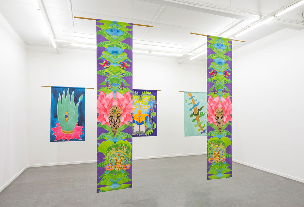 Kate Beynon with Rali Beynon & TudoFAM INCANTATION, Textile banners, 2025. Installation view at Sutton Gallery photography by Andrew Curtis 