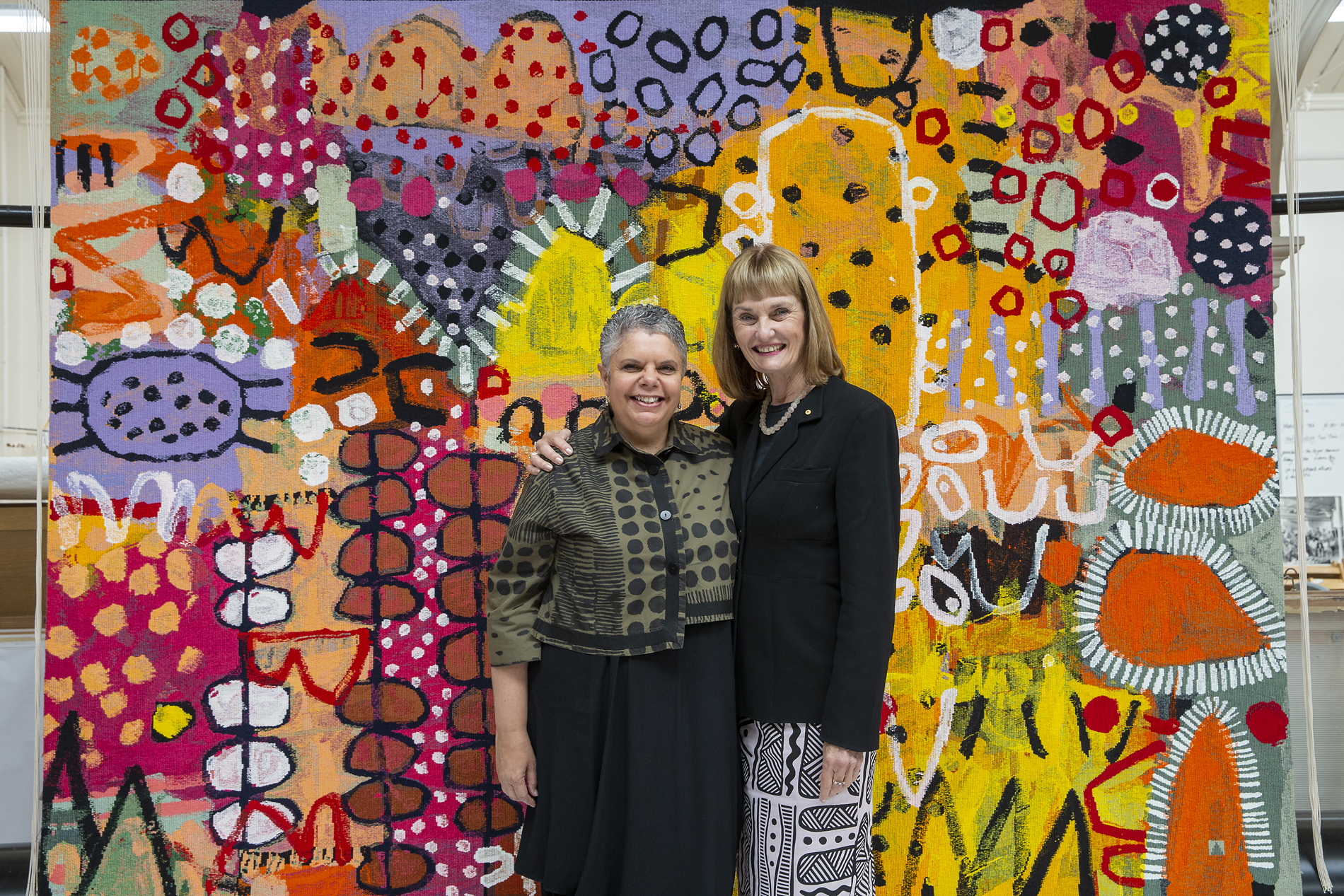ATW Director Antonia Syme AM and Deborah Cheetham AOwith ‘The Royal Harvest’, 2021, Naomi Hobson, currently on loan to the Australian Embassy to Indonesia, Jakarta.Photo: John Gollings AM.
