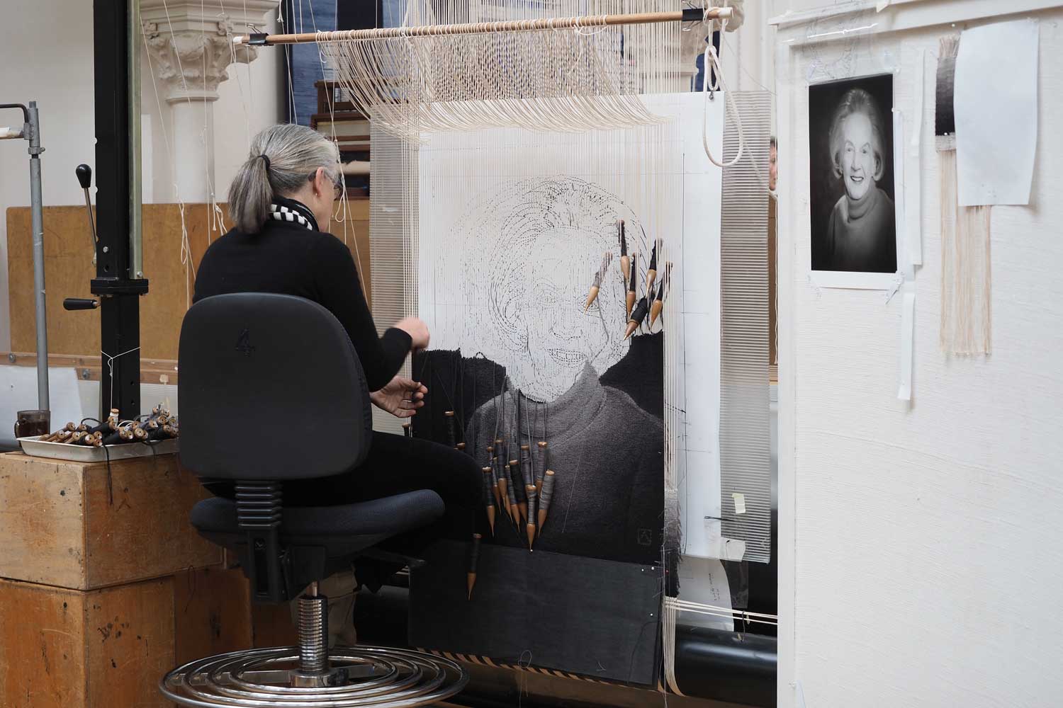 ATW weaver Pamela Joyce working on a portrait of The Honourable Margaret Lusink AM, 2019. Photograph: Peter Ittak.