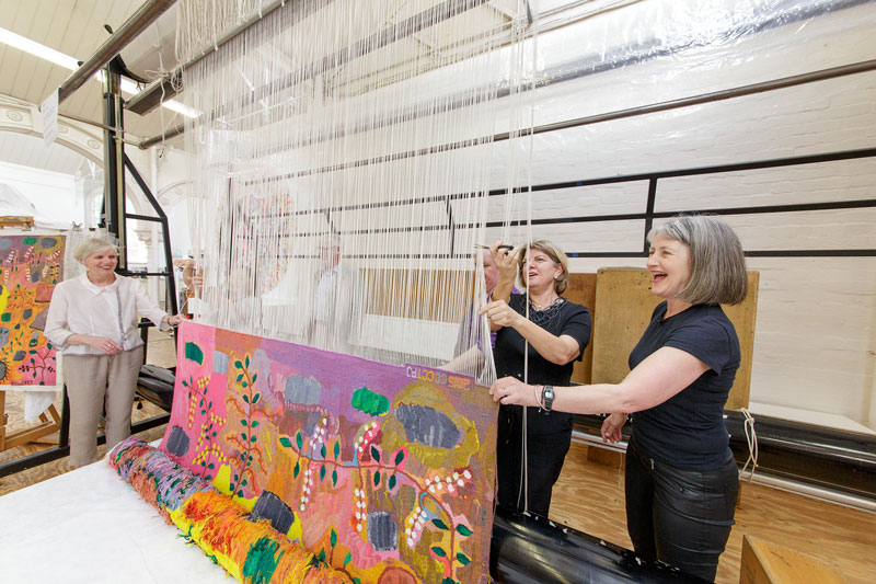 Cutting Off Ceremony for 'Bush Foods,' 2015, designed by Sheena Wilfred and woven by Chris Cochius, Pamela Joyce & Cheryl Thornton, wool and cotton, 1.84 x 2.15m. Photograph: Jeremy Weihrauch.