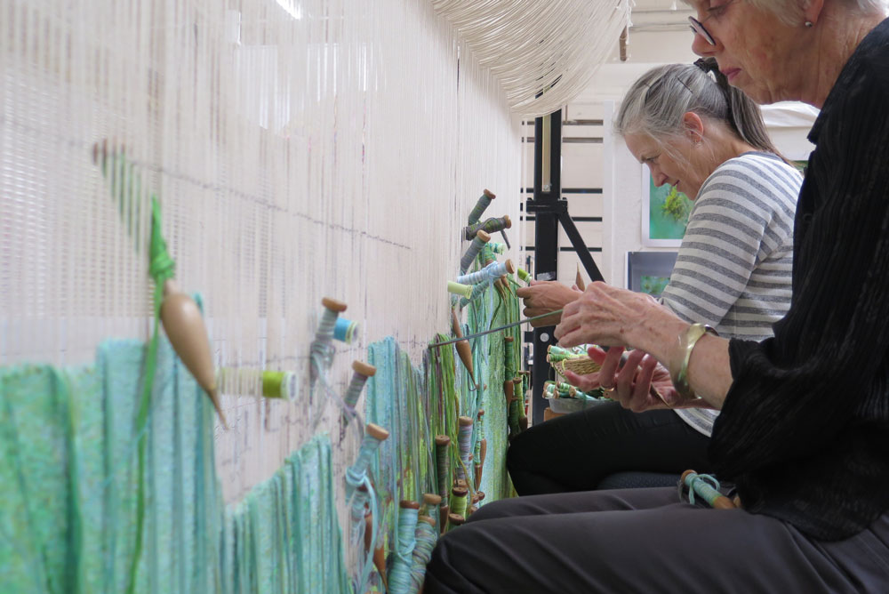 ATW weavers working on 'Listen, to the Sound of Plants' 2017, designed by Janet Laurence and woven by Chris Cochius, Pamela Joyce & Cheryl Thornton, wool and cotton, 1.2 x 2.4m. Photo: ATW. 