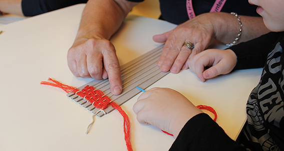 A patient from the Royal Children's Hospital with their Weaving into Wellbeing activity.